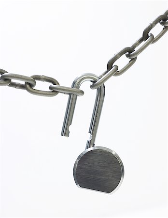 simsearch:640-01354413,k - Close-up of an open lock and a chain Foto de stock - Sin royalties Premium, Código: 640-01365956