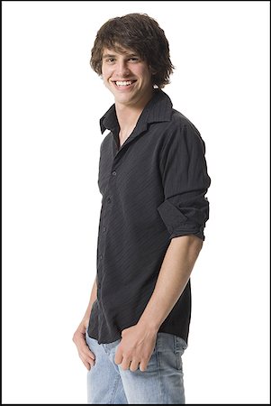 Portrait of a teenage boy smiling Stock Photo - Premium Royalty-Free, Code: 640-01366077