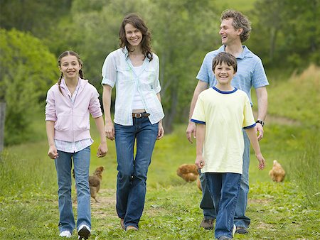 simsearch:640-02767291,k - Family walking in a field Stock Photo - Premium Royalty-Free, Code: 640-01366228