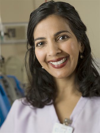 simsearch:640-01364042,k - Portrait of a female nurse smiling Stock Photo - Premium Royalty-Free, Code: 640-01366396