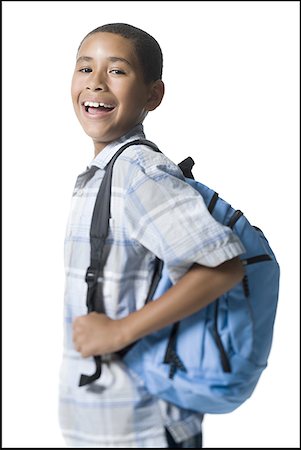 Portrait of a smiling boy with a backpack Stock Photo - Premium Royalty-Free, Code: 640-01360100