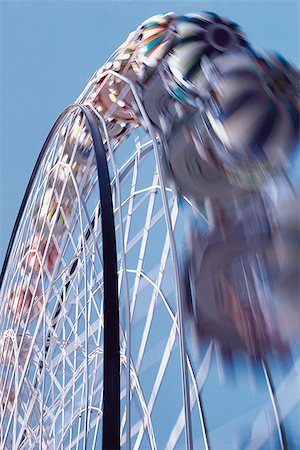 simsearch:625-00805928,k - Low angle view of a ferris wheel Stock Photo - Premium Royalty-Free, Code: 640-01360146
