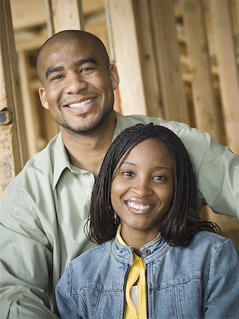 simsearch:640-02764709,k - Portrait of a young couple smiling Stock Photo - Premium Royalty-Free, Code: 640-01360216