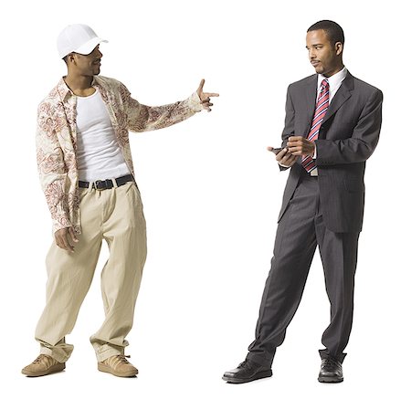 Businessman and casually dressed twins Stock Photo - Premium Royalty-Free, Code: 640-01360219