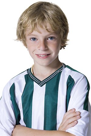 Portrait of a boy with his arms folded Stock Photo - Premium Royalty-Free, Code: 640-01360844