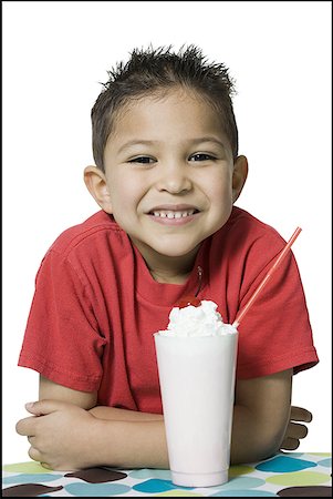 simsearch:640-02767716,k - Portrait of a boy with a glass of ice cream soda Stock Photo - Premium Royalty-Free, Code: 640-01361354