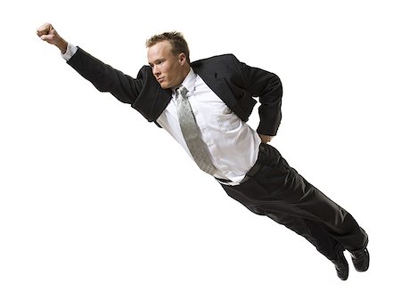 fast business - Businessman flying through the air Stock Photo - Premium Royalty-Free, Code: 640-01361533