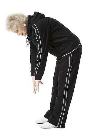 fitness   mature woman - Older woman doing stretching exercises Stock Photo - Premium Royalty-Free, Code: 640-01361679