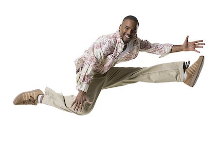 simsearch:640-03265333,k - African American man jumping Stock Photo - Premium Royalty-Free, Code: 640-01361761