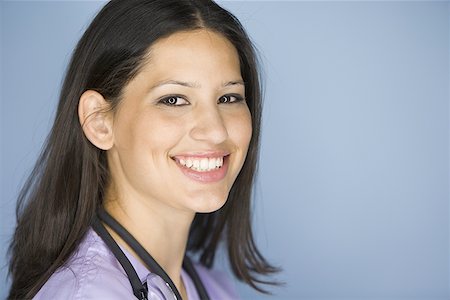 simsearch:640-01364042,k - Portrait of a female nurse smiling Stock Photo - Premium Royalty-Free, Code: 640-01361889