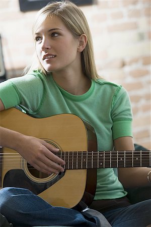simsearch:640-01365707,k - Close-up of a teenage girl playing the guitar Stock Photo - Premium Royalty-Free, Code: 640-01362084