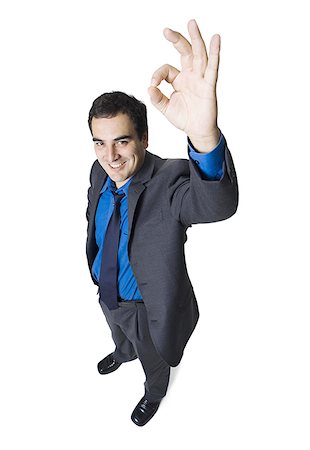 simsearch:640-01350815,k - High angle view of a businessman making an OK sign Stock Photo - Premium Royalty-Free, Code: 640-01362440