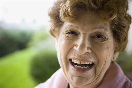 photos of 70 year old women faces - Portrait of a senior woman laughing Stock Photo - Premium Royalty-Free, Code: 640-01362458
