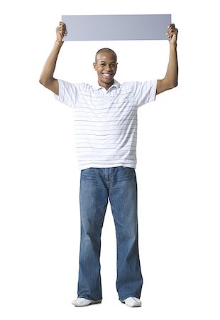 simsearch:640-01349238,k - Portrait of a young African- American man holding a blank sign over his head Stock Photo - Premium Royalty-Free, Code: 640-01362580