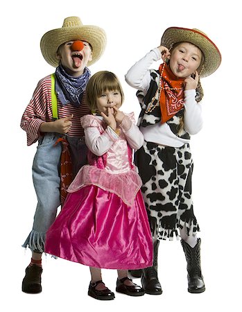 Two girls and a boy making faces in costumes Stock Photo - Premium Royalty-Free, Code: 640-01362818