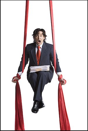 simsearch:640-01363355,k - Businessman tangled in red drapes Stock Photo - Premium Royalty-Free, Code: 640-01363011