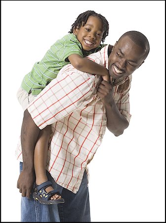 Father playing with young son Stock Photo - Premium Royalty-Free, Code: 640-01363142