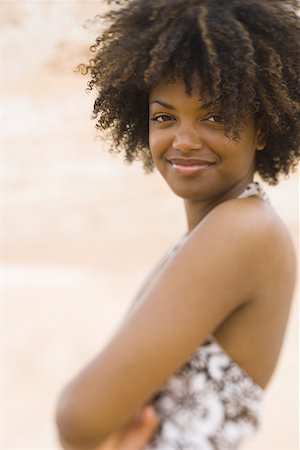 simsearch:640-01358229,k - Profile of a young woman smiling Stock Photo - Premium Royalty-Free, Code: 640-01363485