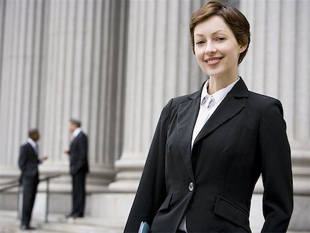 simsearch:640-02767805,k - Portrait of a female lawyer smiling Stock Photo - Premium Royalty-Free, Code: 640-01363637