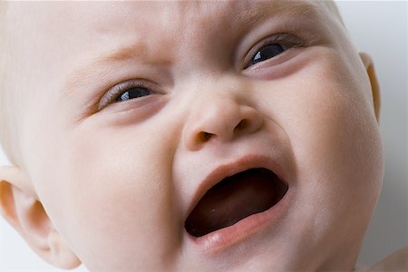 simsearch:640-01359777,k - Close-up of a baby girl crying Stock Photo - Premium Royalty-Free, Code: 640-01363678