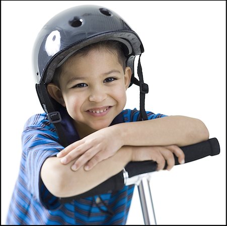 simsearch:640-01359777,k - Portrait of a boy on a push scooter Stock Photo - Premium Royalty-Free, Code: 640-01363698