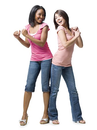 Two women smiling and dancing Stock Photo - Premium Royalty-Free, Code: 640-01575234