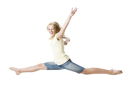 simsearch:640-01601671,k - Girl leaping and smiling with arms up Stock Photo - Premium Royalty-Free, Code: 640-01601666