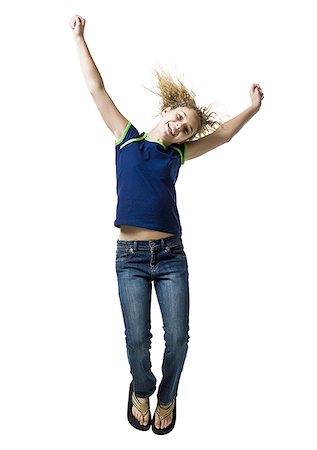 simsearch:640-01601671,k - Girl leaping and smiling with arms up Stock Photo - Premium Royalty-Free, Code: 640-01601709