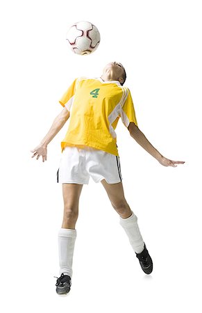 simsearch:640-03256208,k - Ballon de soccer de rubrique adolescente Photographie de stock - Premium Libres de Droits, Code: 640-01645752