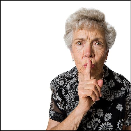 shhh - Senior woman shushing camera. Stock Photo - Premium Royalty-Free, Code: 640-02656808