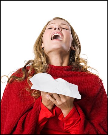 people coughing or sneezing - young woman sneezing. Stock Photo - Premium Royalty-Free, Code: 640-02657230