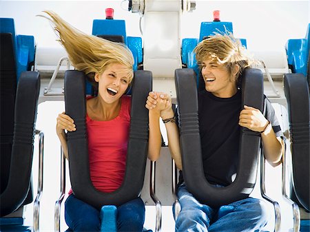 roller-coaster - young couple at an amusement park Stock Photo - Premium Royalty-Free, Code: 640-02657781