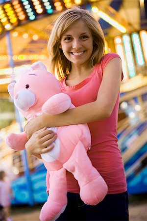 young woman with a stuffed animal Stock Photo - Premium Royalty-Free, Code: 640-02657803