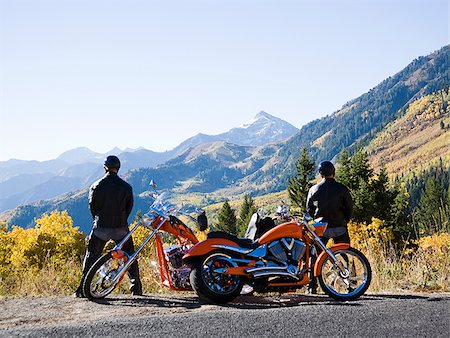 two bikers stopping to pee Stock Photo - Premium Royalty-Free, Code: 640-02658172