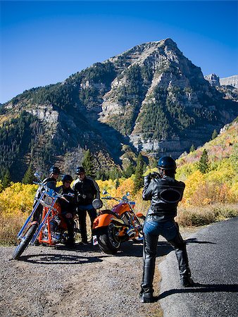 bikers taking a photo on the side of the road Stock Photo - Premium Royalty-Free, Code: 640-02658173