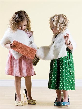 girls playing dress up Stock Photo - Premium Royalty-Free, Code: 640-02658824