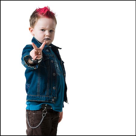 little boy making peace sign Stock Photo - Premium Royalty-Free, Code: 640-02658859