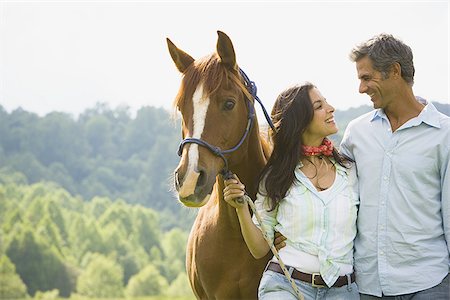 simsearch:640-01356213,k - A Man and a woman standing with a horse Stock Photo - Premium Royalty-Free, Code: 640-02764689