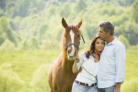 simsearch:640-01356213,k - Mature man and a woman with a horse Stock Photo - Premium Royalty-Free, Code: 640-02764681