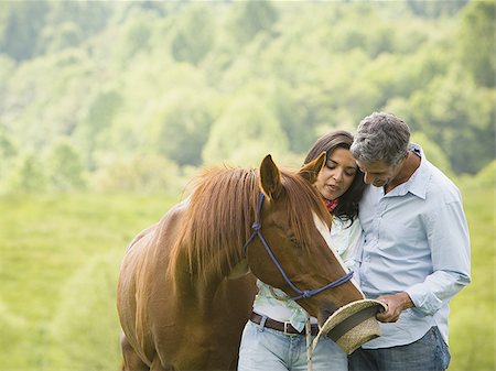 simsearch:640-01356213,k - Mature man and a woman with a horse Stock Photo - Premium Royalty-Free, Code: 640-02764682