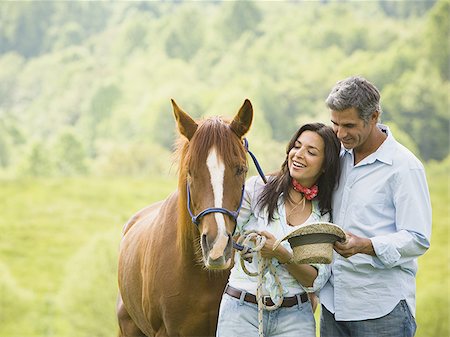 simsearch:640-01356213,k - Mature man and a woman with a horse Stock Photo - Premium Royalty-Free, Code: 640-02764683