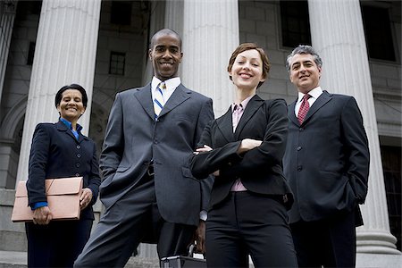 simsearch:640-01350504,k - Low angle view of lawyers in front of a courthouse Foto de stock - Sin royalties Premium, Código: 640-02764722