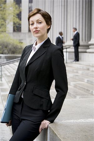 simsearch:640-02767805,k - Portrait of a female lawyer smiling Stock Photo - Premium Royalty-Free, Code: 640-02764732