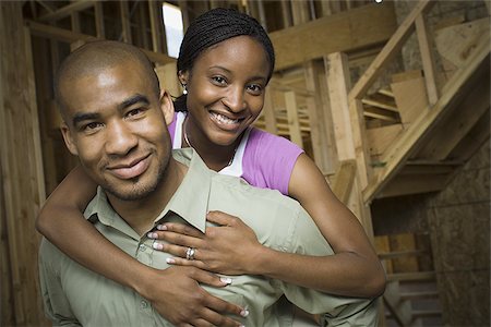 simsearch:640-02764709,k - Portrait of a young adult couple in a house that is under construction Stock Photo - Premium Royalty-Free, Code: 640-02764771