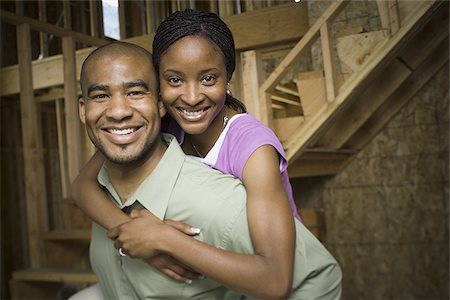 simsearch:640-02764709,k - Portrait of a young adult couple in a house that is under construction Stock Photo - Premium Royalty-Free, Code: 640-02764772