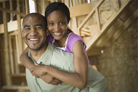 simsearch:640-02764709,k - Portrait of a young adult couple in a house that is under construction Stock Photo - Premium Royalty-Free, Code: 640-02764773