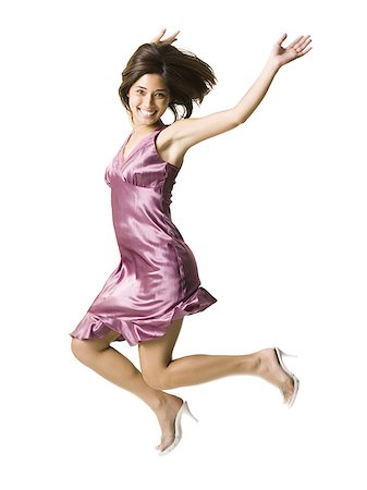 simsearch:640-03265333,k - Woman jumping Stock Photo - Premium Royalty-Free, Code: 640-02764862