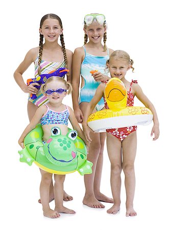 Young sisters in swimsuits on vacation Stock Photo - Premium Royalty-Free, Code: 640-02764880