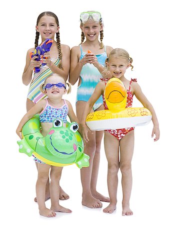 Young sisters in swimsuits on vacation Stock Photo - Premium Royalty-Free, Code: 640-02764881