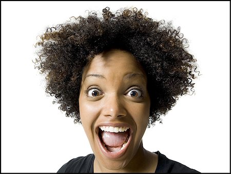 Portrait of a young woman shouting Stock Photo - Premium Royalty-Free, Code: 640-02766573